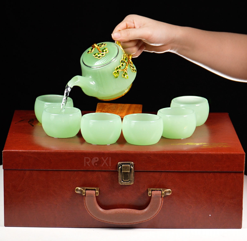 Bộ ấm trà ngọc xanh tùng trường thọ.png